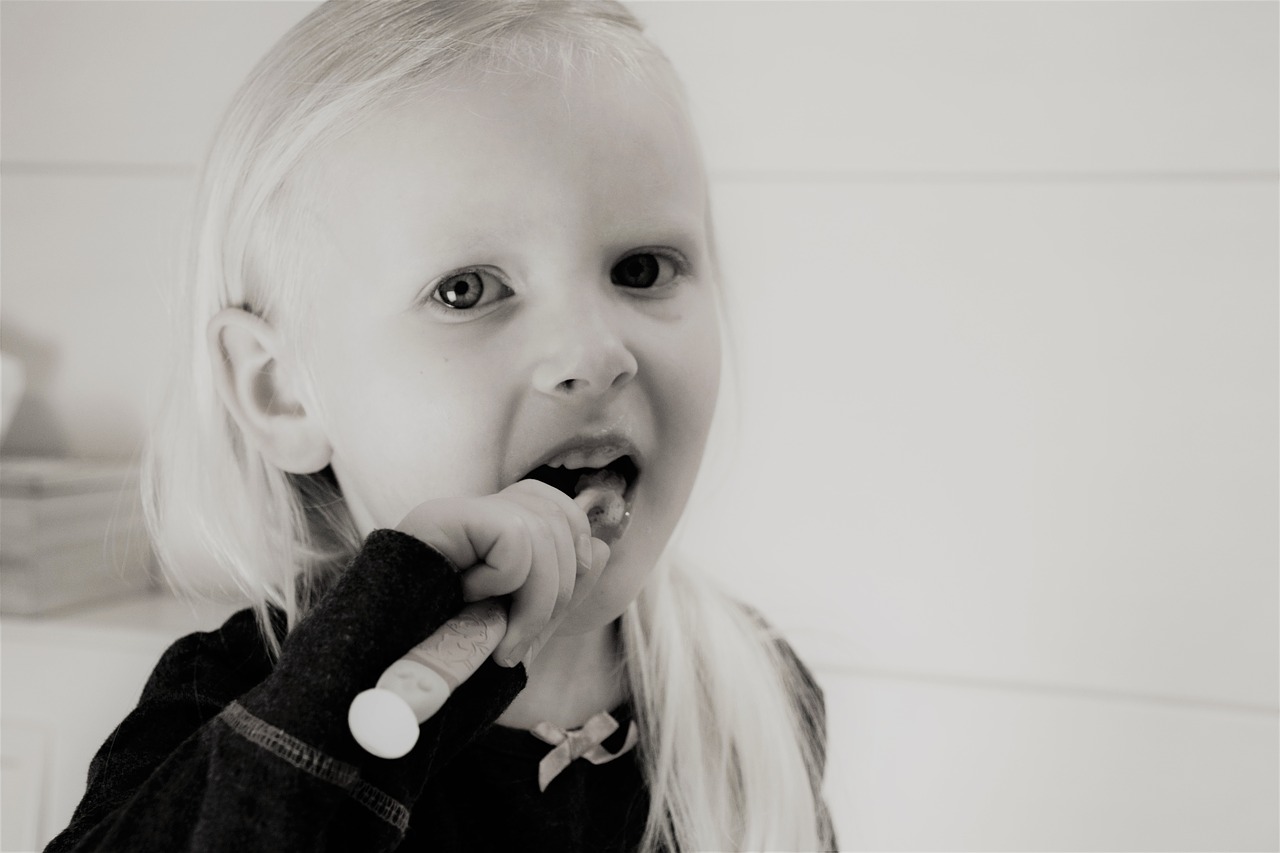 holding toothbrush
